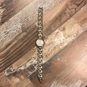 Gold and silver Fossil watch